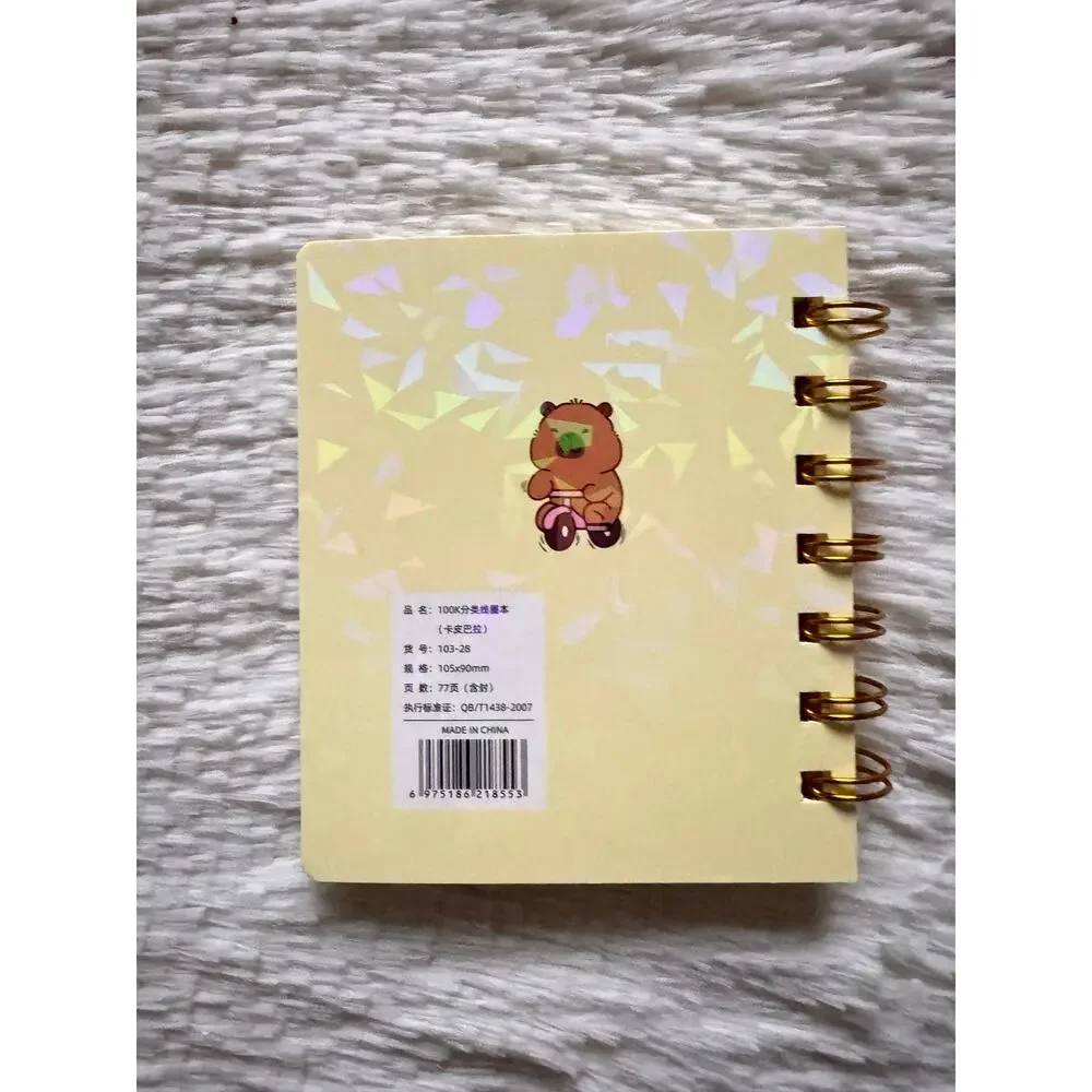 Capybara A6 spiral  mini notebook with cute capybara riding a pink tricycle
